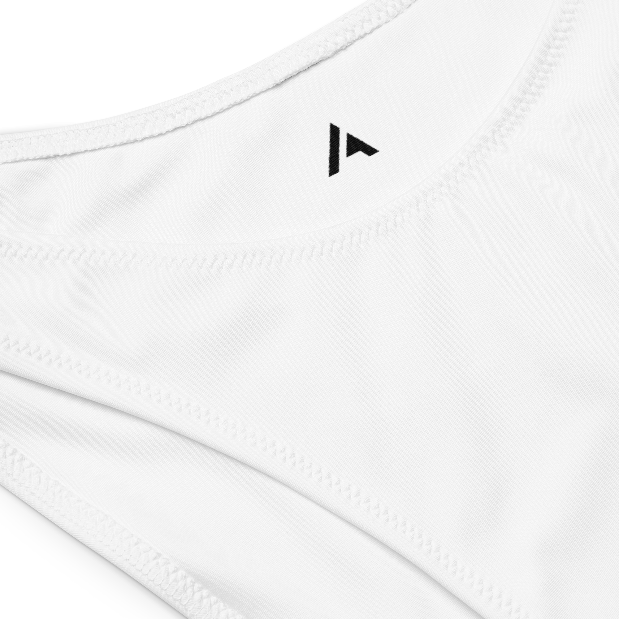 Product close-up of a high-waist bottom with our black logo